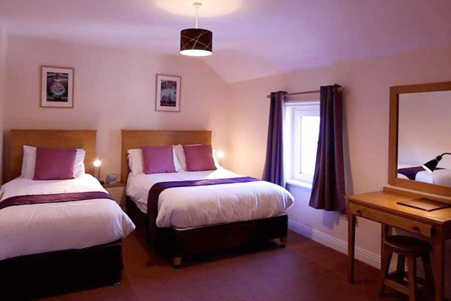 Slaapkamer 7-kamer cottage, Ryans Retreats