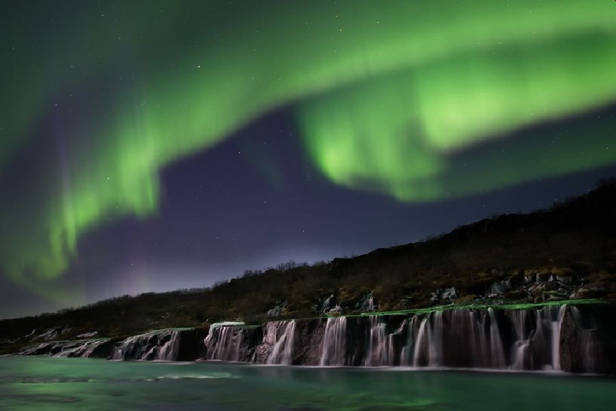 Hraunfossar winter noorderlicht IJsland