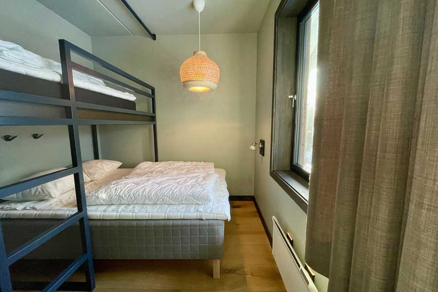 Slaapkamer in het 4-kamerappartement in Gausta Sportell