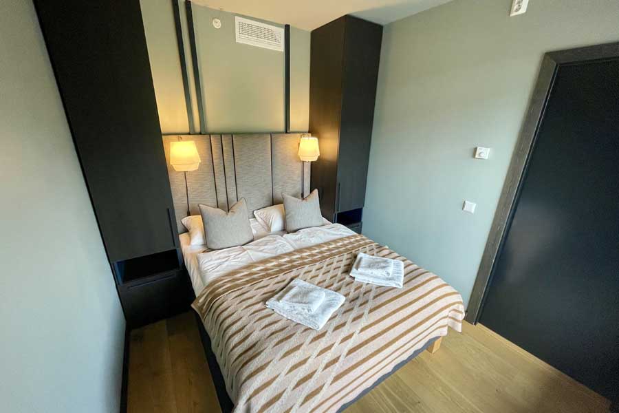 Tweepersoonskamer in het 4-kamerappartement in Gausta Sportell