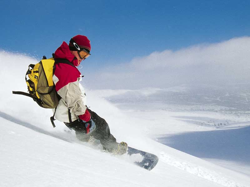 Snowboarder op de piste