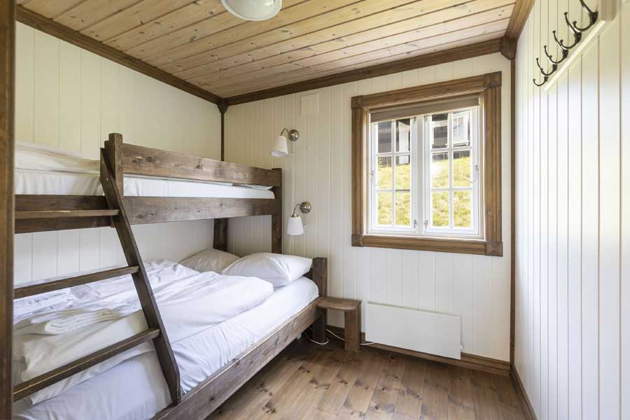 Slaapkamer met een stapelbed Holtardalen chalets