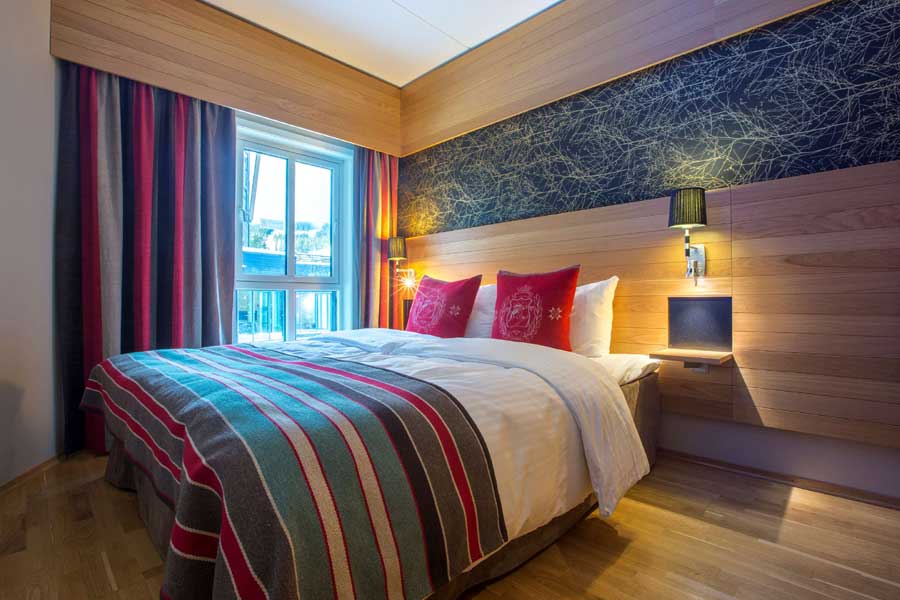Slaapkamer van een familiekamer in het Radisson Blu Trysil Resort